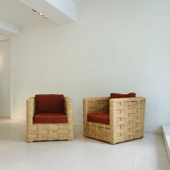 Pair of chairs, wooden structure trimmed with braided raffia